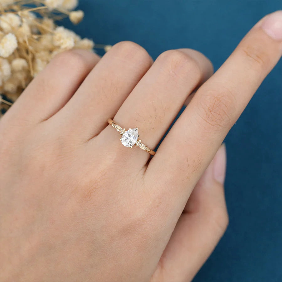 Pear cut moissanite Solitaire  Engagement Ring MRG025